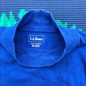 Blue turtleneck shirt